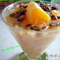 Riz_au_lait_a_l_orangeC Riz au lait à l'orange et aux pipasols grillées (Tatyval)