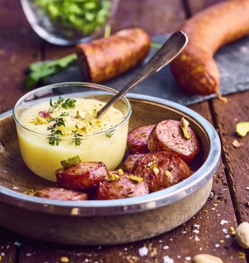 Photo de la recette : Saucisses de Montbéliard à la pistache et purée de panais